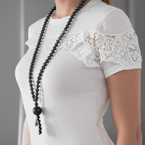 mala necklace worn by woman