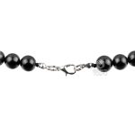 Close-up of polished 10mm shungite beads