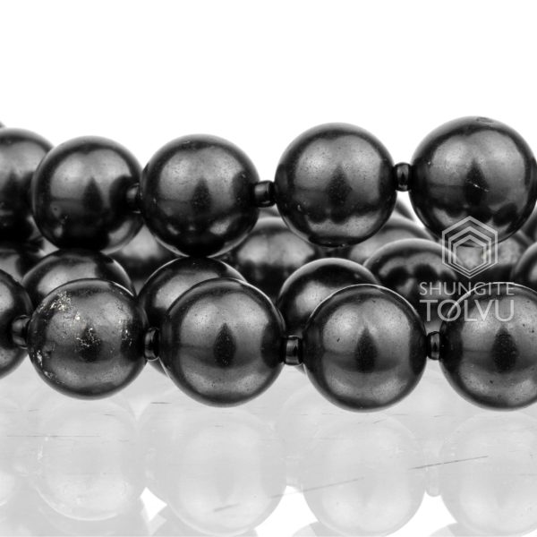 natural inclusions in shungite bead – pyrite and quartz